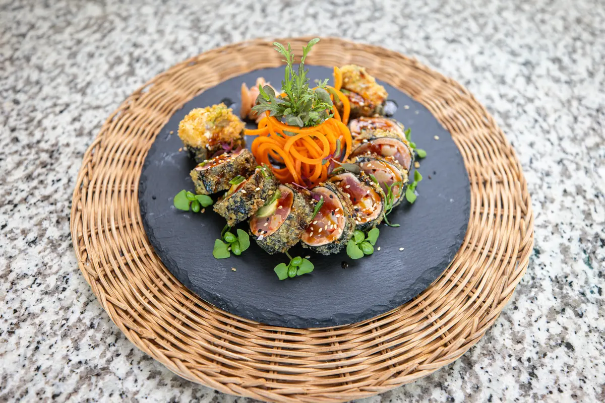 Tuna roll with avocado and sesame crust